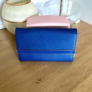 Blue leather wallet/clutch.